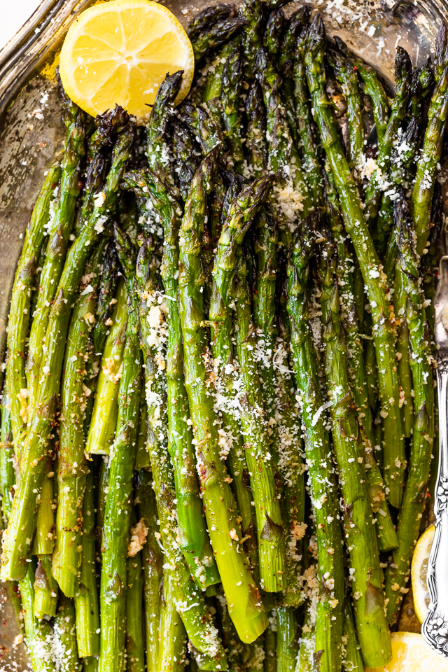This Lemon Garlic Parmesan Asparagus is a quick and easy side dish that's ready in less than 20 minutes! Perfect with grilled meat, seafood, or a ball of burrata and some charred bread! No matter what you serve it with, I just know you're going to love this recipe!