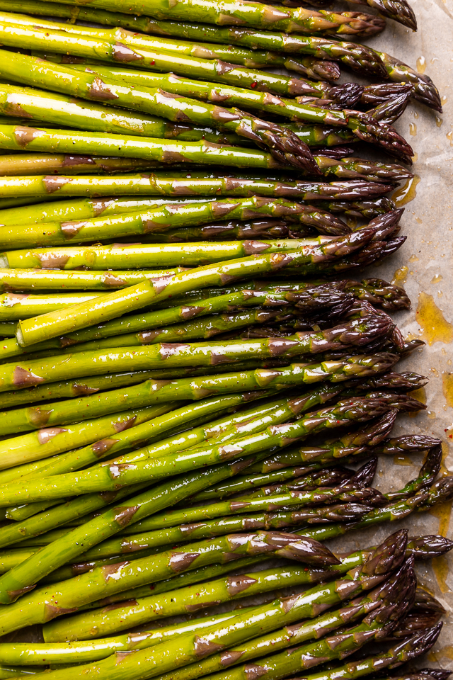 This Lemon Garlic Parmesan Asparagus is a quick and easy side dish that's ready in less than 20 minutes! Perfect with grilled meat, seafood, or a ball of burrata and some charred bread! No matter what you serve it with, I just know you're going to love this recipe!