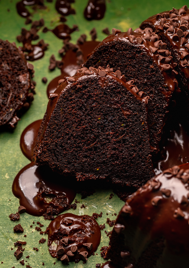 This Chocolate Zucchini Bundt Cake is insanely moist, so fudgy, and loaded with chocolate flavor! No one will even know there's 2 whole cups of shredded zucchini hiding inside! Delicious with chocolate glaze, but can easily be served with whipped cream or a dusting of powdered sugar instead!