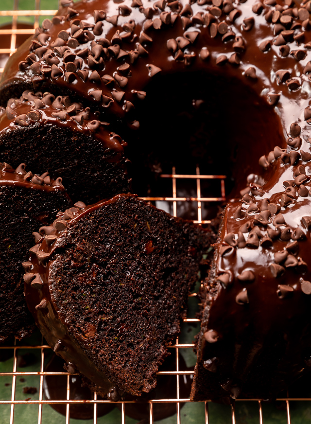 This Chocolate Zucchini Bundt Cake is insanely moist, so fudgy, and loaded with chocolate flavor! No one will even know there's 2 whole cups of shredded zucchini hiding inside! Delicious with chocolate glaze, but can easily be served with whipped cream or a dusting of powdered sugar instead!