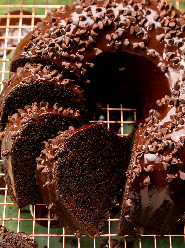 This Chocolate Zucchini Bundt Cake is insanely moist, so fudgy, and loaded with chocolate flavor! No one will even know there's 2 whole cups of shredded zucchini hiding inside! Delicious with chocolate glaze, but can easily be served with whipped cream or a dusting of powdered sugar instead!