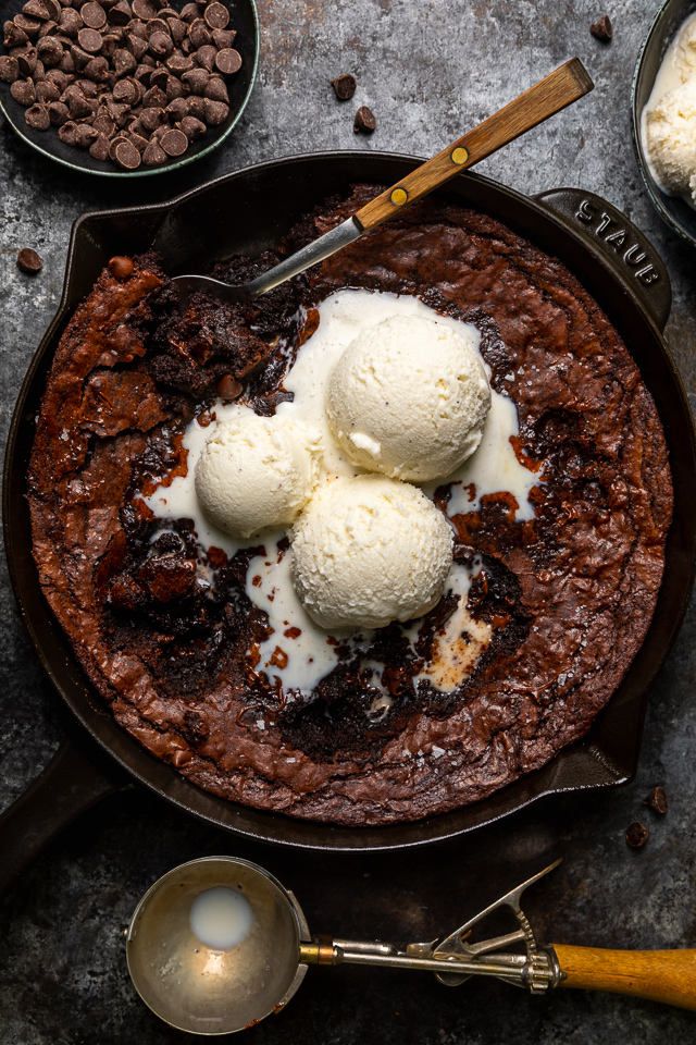 These Easy Skillet Brownies are gooey, fudgy, and so decadent! Made with cocoa powder, melted chocolate, and chocolate chips, these fudgy brownies are definitely for chocolate lovers only! Serve warm, with a few giant scoops of vanilla ice cream on top!