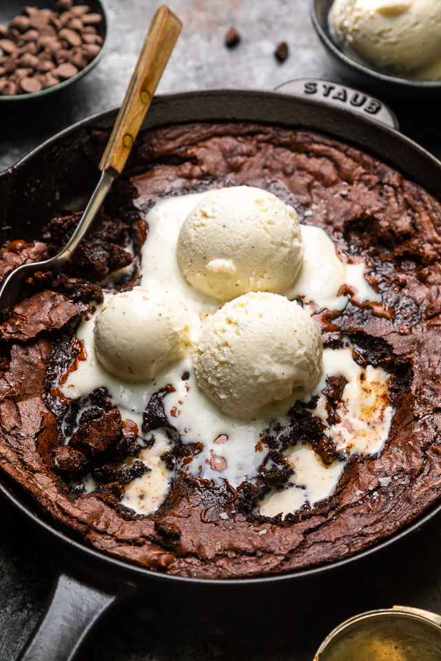 These Easy Skillet Brownies are gooey, fudgy, and so decadent! Made with cocoa powder, melted chocolate, and chocolate chips, these fudgy brownies are definitely for chocolate lovers only! Serve warm, with a few giant scoops of vanilla ice cream on top!