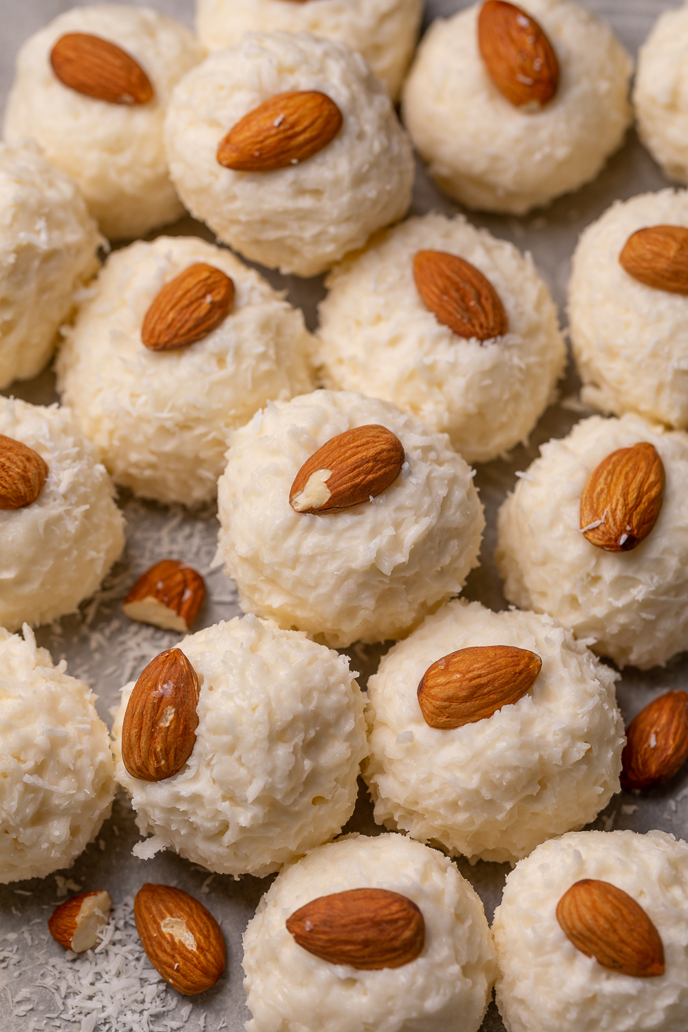 If you like almond joy candy bars, you'll love these almond joy truffles! The coconut mixture is so creamy, it almost tastes like cheesecake, and the rich robe of milk chocolate makes them so decadent! But feel free to dip in dark chocolate for a less sweet treat!