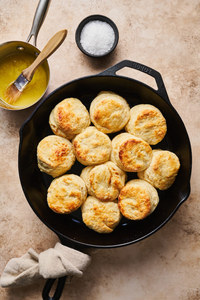 Homemade Buttermilk Biscuits in a cast iron skillet.