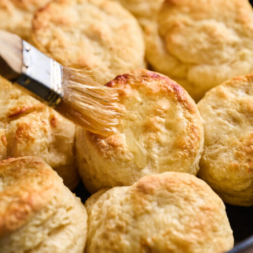 Flaky Golden Brown Buttermilk Biscuits are perfect for breakfast, brunch, or dinner! An easy crowd-pleasing recipe that will instantly become a favorite with your family! No food processor required!