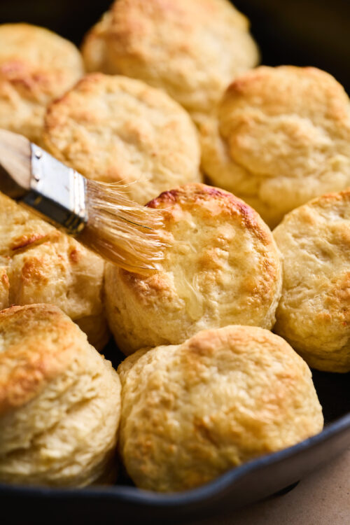 Flaky Golden Brown Buttermilk Biscuits are perfect for breakfast, brunch, or dinner! An easy crowd-pleasing recipe that will instantly become a favorite with your family! No food processor required!
