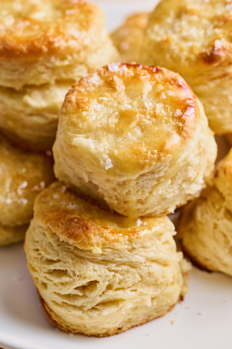 Flaky Golden Brown Buttermilk Biscuits are perfect for breakfast, brunch, or dinner! An easy crowd-pleasing recipe that will instantly become a favorite with your family! No food processor required!