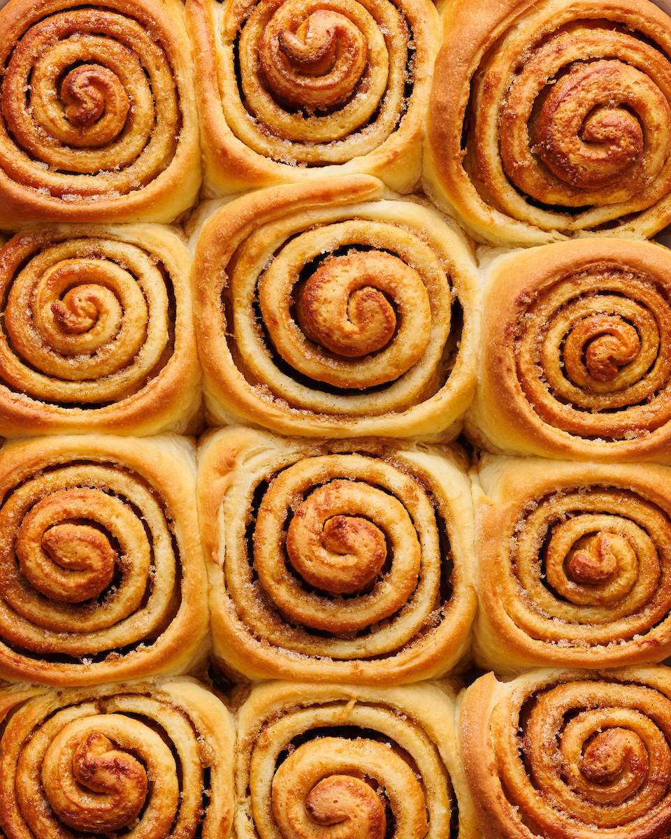 Soft and fluffy orange rolls are loaded with fresh orange flavor and slathered in cream cheese frosting! This special breakfast treat is a Christmas morning tradition in our house... but they're so good we've started making them for Easter, Mother's Day and sometimes, just because! Serve warm, straight from the baking dish!