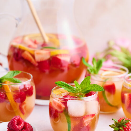 The only thing better than rosé wine is rosé sangria! And this refreshing rosé sangria recipe is made in a large pitcher and chilled in the fridge so it's ready to serve when your guests arrive. Garnish with fresh raspberries, strawberries, and citrus slices for a stunning presentation.