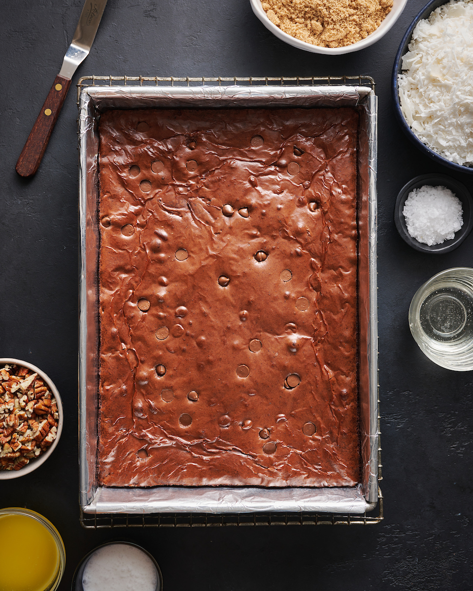If you're like me and LOVE German chocolate cake, you have to try these German Chocolate Brownies! No boxed mix, instead we'll make brownies from scratch and top them with a crazy delicious coconut pecan frosting. We loved these brownies and think you will too!