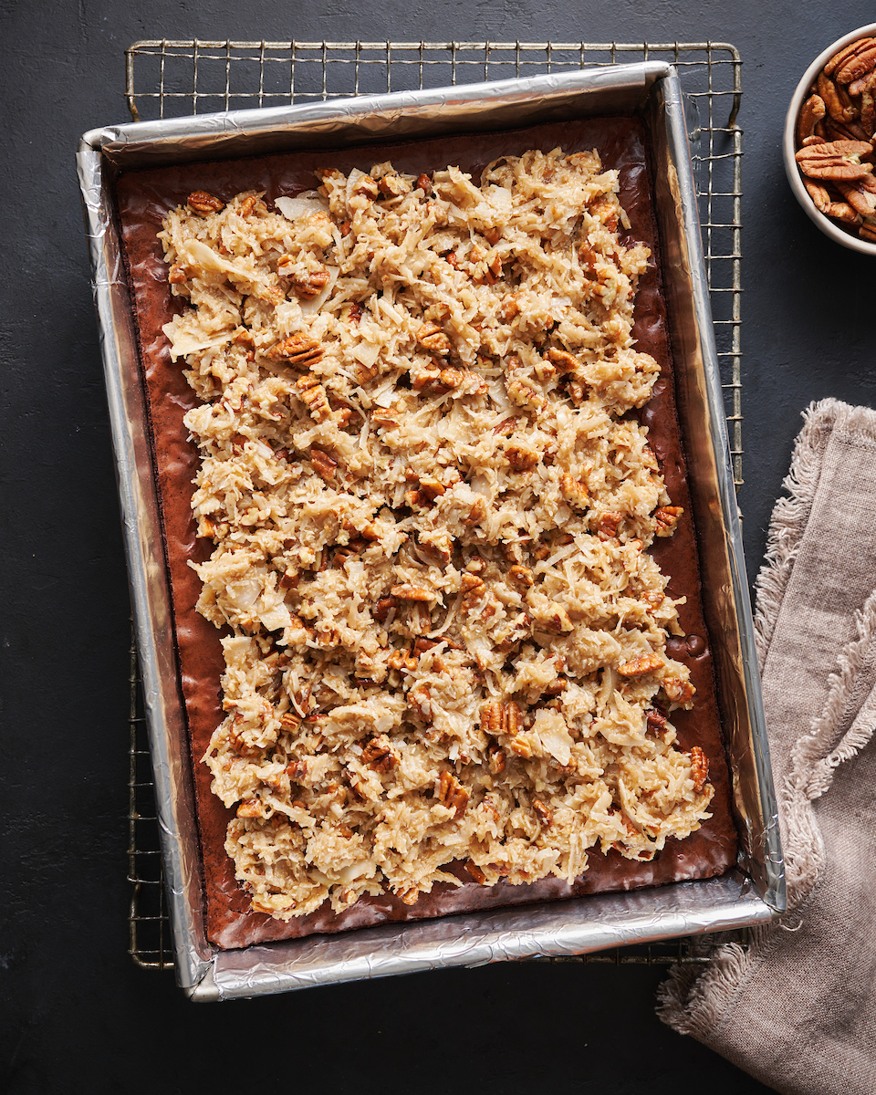 If you're like me and LOVE German chocolate cake, you have to try these German Chocolate Brownies! No boxed mix, instead we'll make brownies from scratch and top them with a crazy delicious coconut pecan frosting. We loved these brownies and think you will too!