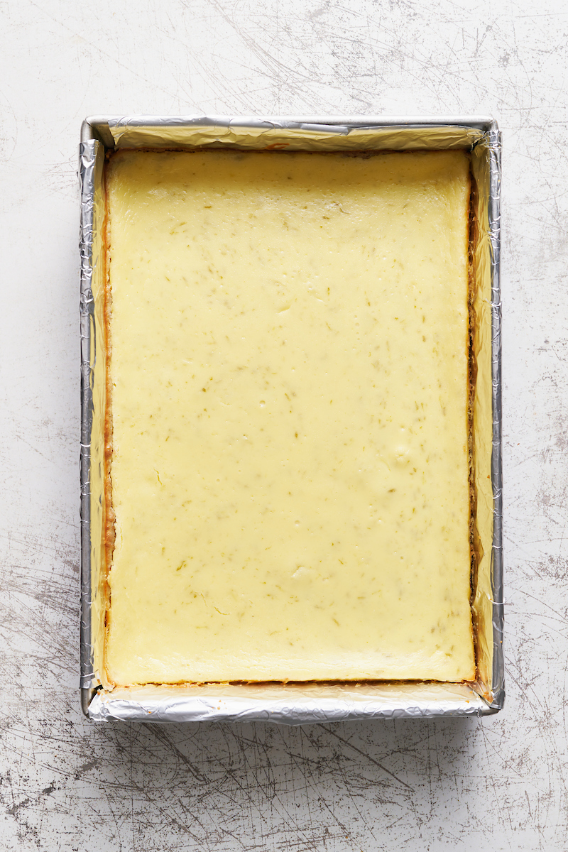 If you like key lime pie and cheesecake, you'll love key lime cheesecake bars! Featuring a crunchy graham cracker crust and a creamy key lime-flavored cheesecake filling, they're just begging to be topped with a dollop of whipped cream. Baked in a 9x13-inch baking pan, these bars easily serve a crowd.