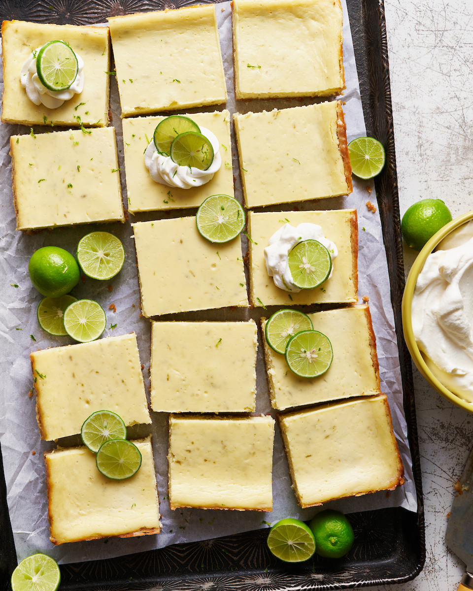 If you like key lime pie and cheesecake, you'll love key lime cheesecake bars! Featuring a crunchy graham cracker crust and a creamy key lime-flavored cheesecake filling, they're just begging to be topped with a dollop of whipped cream. Baked in a 9x13-inch baking pan, these bars easily serve a crowd.