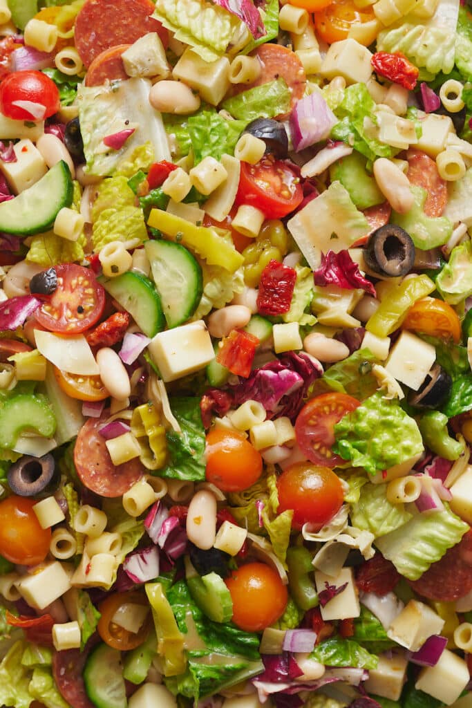 Bowl of Italian chopped salad tossed and ready to serve.
