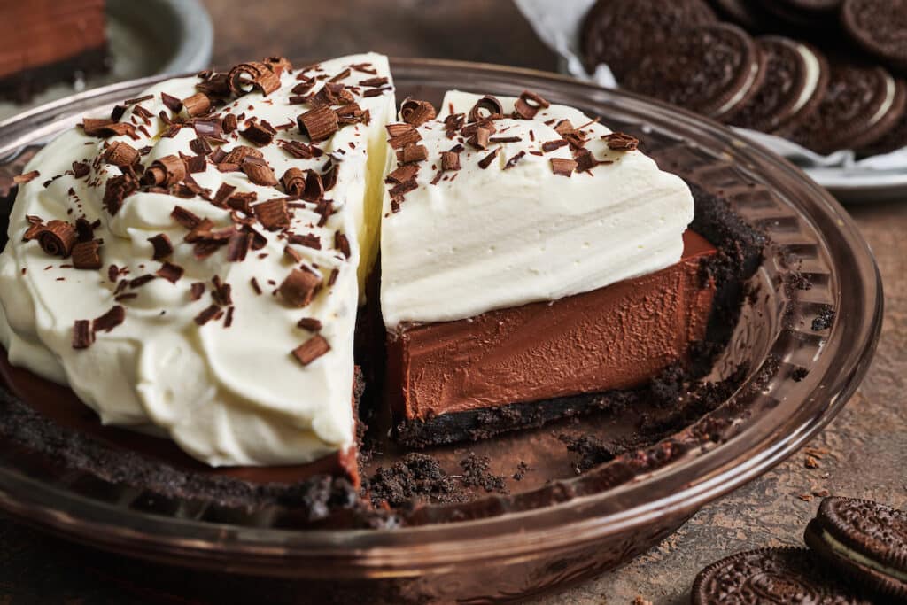 Chocolate cream pie in a pie plate.