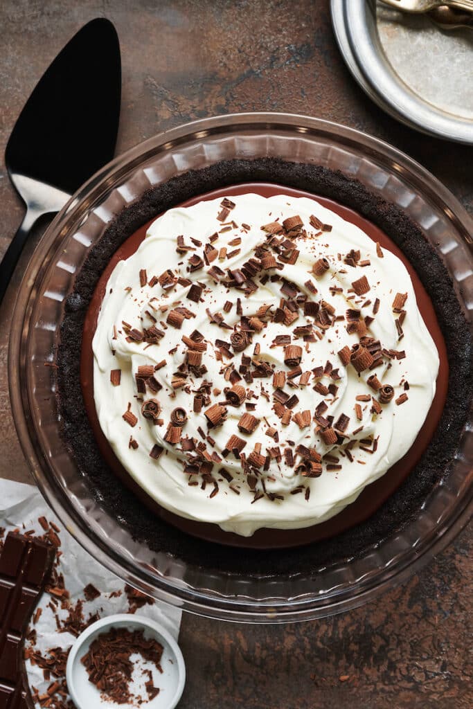 Chocolate cream pie with whipped cream on top.