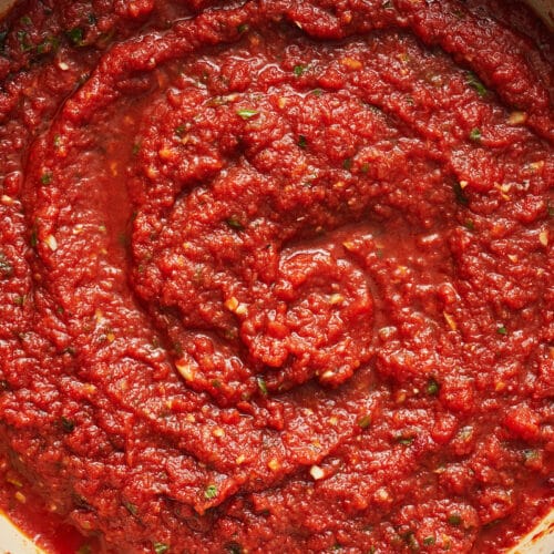 Marinara sauce in a large pan.